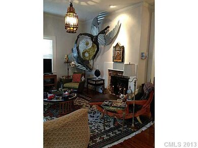 Living Room - Decorative fireplace and suspended s
