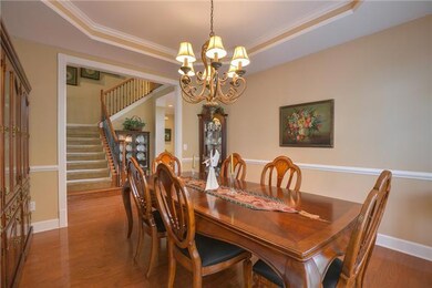 Large dining room with trey ceiling measures 14 x 12