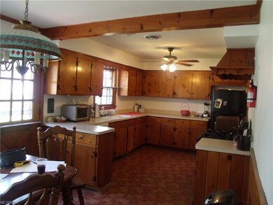 Very large country kitchen!!  Unusual find in Euclid!  Loads of cupboards and counter space as well as natural sunlight!