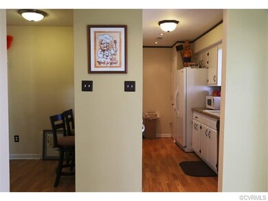 Kitchen, breakfast bar, and office space off the d