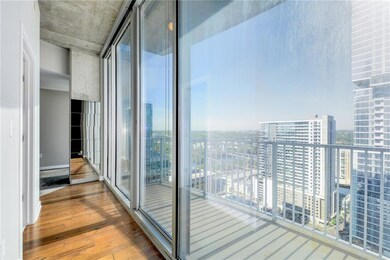 Balcony featuring a view of city
