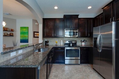 Sleek contemporary kitchen with plenty of cabinets