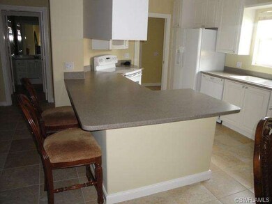 Breakfast Bar with Corian Counter Tops