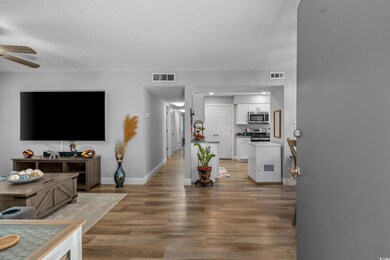 Living area featuring light wood finished floors, 