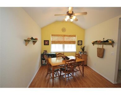 Dining Room. New Carpet, wood laminate flooring in living room & dining room