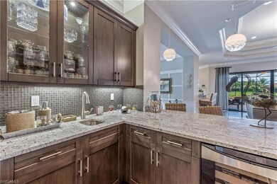 Wet bar with beverage fridge.