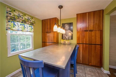 Two large pantries adorn the eat-in kitchen area