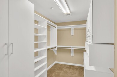 The Walk-In Closet is approx. 12'x7'* with custom