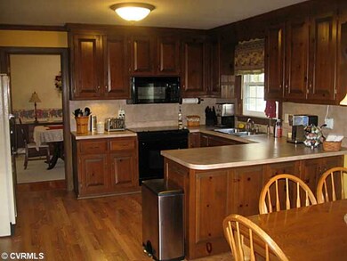 Kitchen - Custom Cabinets, Wood Floor and beautifu
