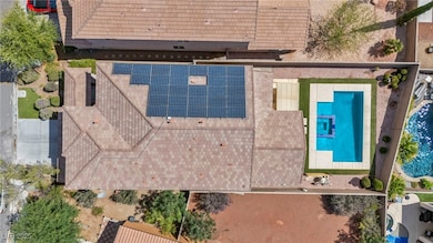 View from above of property with a pool area