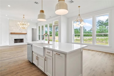 Kitchen opens to dining and living area