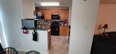 Kitchen with black appliances
