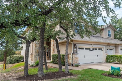 View of front facade featuring concrete driveway,