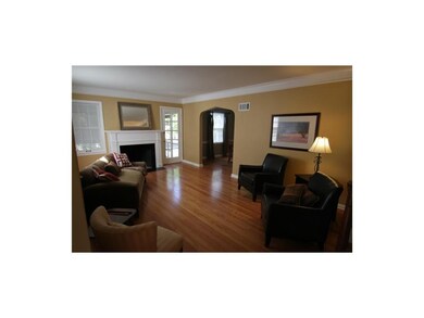 The livingroom greets you with the warmth of a fir