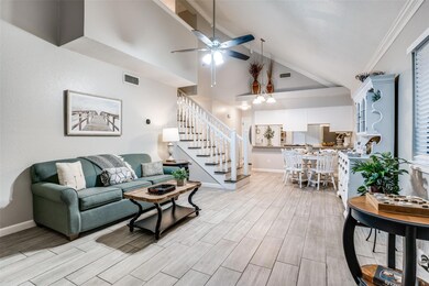 Living room featuring high vaulted ceiling, ceilin