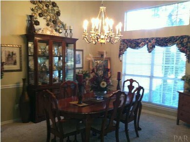 Formal Dining Room with 12 foot ceilings and crown molding