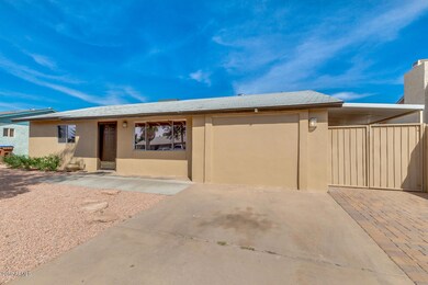 RV gate with parking shade