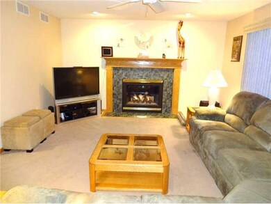 Family Room. Gas fireplace...window to right faces