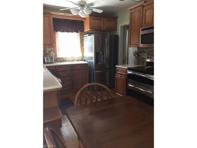 Beautiful kitchen with custom cabinets, glass and 