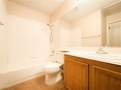 Bathroom featuring vanity, bathing tub / shower co