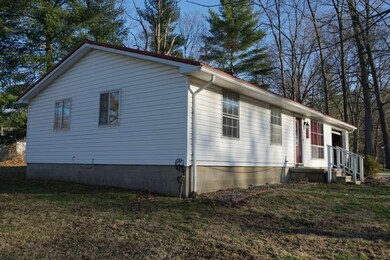 Side view of the home shows the yard space availab
