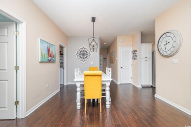 Dining space featuring dark hardwood / wood-style 