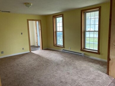 Living room looking into entryway