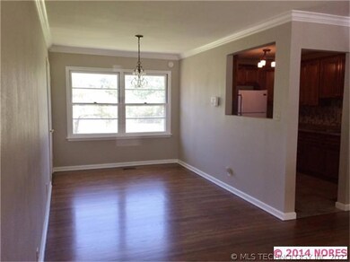 Separate dining area with pass through to kitchen.
