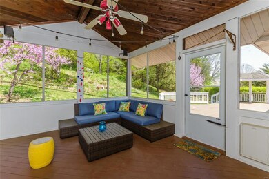 Enjoy your summers relaxing on the sun porch overlooking the private backyard & adjacent to deck ~ mosquito free!