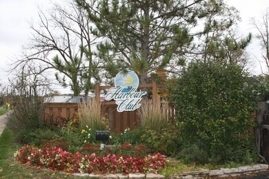 The Harbor Club is within walking distance to wate