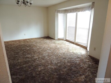 Living room with bay window to south