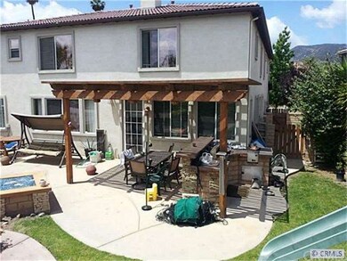 Back of House with Built in BBQ Island
