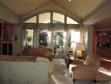 Windows overlook back covered patio. Great views.