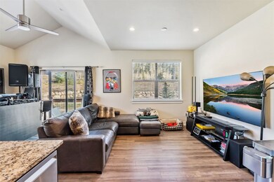 Living room featuring wood finished floors, ceilin