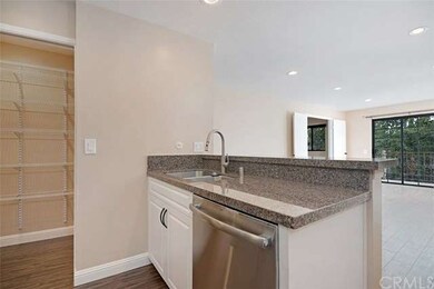 Raised matching granite serving counter open to th