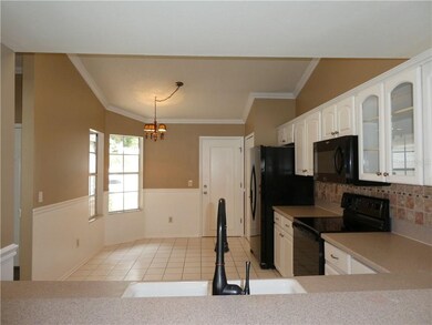 Large kitchen with breakfast nook and pantry featu