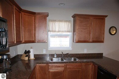 Gaze into the back yard as you do the dishes.