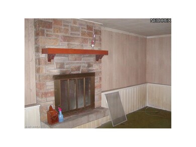 Family room with wood burning fireplace