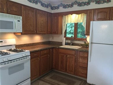 Granite kitchen with ceramic tile flooring all new