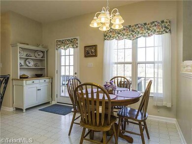 Breakfast. The sunny breakfast room overlooks the deck and back yard and is perfect for casual dining