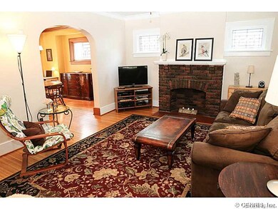 Living Room. Brick adds to the cosmetic appeal of 