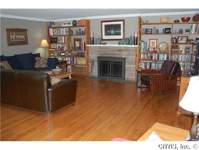 Living Room. Custom built book shelves encase a wo