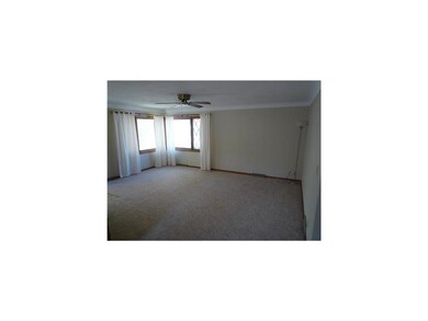 Living Room. Family-sized living room with large w