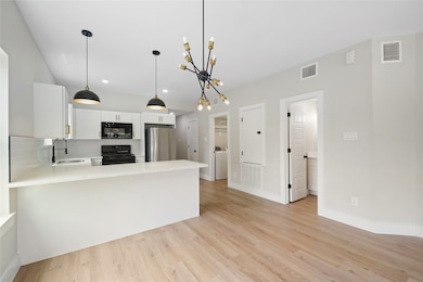 Open concept living space. Photos of a different d