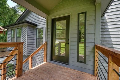 Exterior entry with a wooden deck