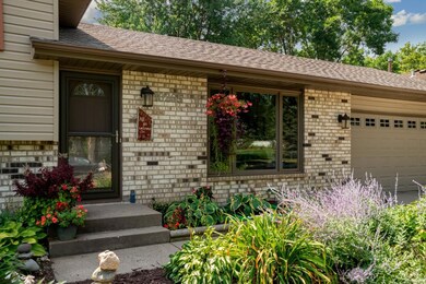 Stunning perennial garden welcomes you.