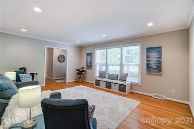A view of the living room into the formal hallway 