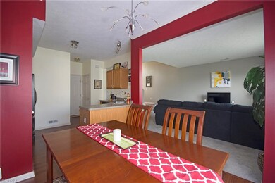 Dining room and kitchen opening up to living room