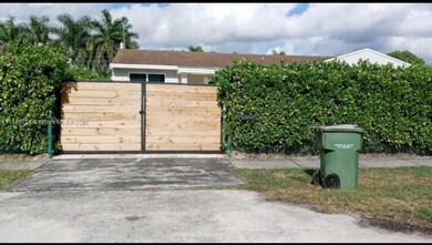 Property is fully fenced with privacy hedges & has