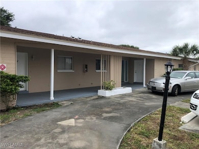 Ranch-style house featuring a carport